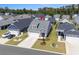 Aerial view of the home, showing its landscaping and proximity to other houses at 1031 Cascade Loop, Little River, SC 29566