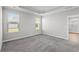 Bedroom featuring neutral carpet and recessed ceilings, with ample natural light at 1031 Cascade Loop, Little River, SC 29566