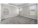 Cozy bedroom featuring neutral carpet, recessed ceilings, and many windows allowing natural light at 1031 Cascade Loop, Little River, SC 29566