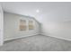 Bedroom with neutral color palette and a window overlooking neighborhood at 1031 Cascade Loop, Little River, SC 29566