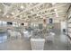 Bright clubhouse interior with ample seating, modern decor, and large windows for natural light at 1031 Cascade Loop, Little River, SC 29566