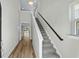 Inviting entryway with staircase and view to the living room and backyard at 1031 Cascade Loop, Little River, SC 29566