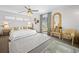 Bright bedroom featuring a large bed, neutral tones, and tasteful decor with a view at 109 Pioneer Loop, Georgetown, SC 29440