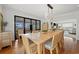 Bright dining room with hardwood floors and lots of natural light and comfortable seating at 109 Pioneer Loop, Georgetown, SC 29440
