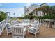Cozy outdoor seating area with plush chairs, a fire pit, and views of the beach at 109 Pioneer Loop, Georgetown, SC 29440