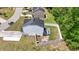 Aerial view of a fenced backyard with a small patio, offering privacy and outdoor enjoyment at 109 Winding Path Dr., Loris, SC 29569