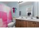 Bathroom with a double vanity, a tub/shower, and a soft colored pink shower curtain at 109 Winding Path Dr., Loris, SC 29569