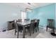 Contemporary dining area features a table with six chairs and modern light fixture at 109 Winding Path Dr., Loris, SC 29569