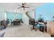 Open concept space with modern table and chairs and adjacent workstation at 109 Winding Path Dr., Loris, SC 29569