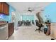 Open concept dining and living area with modern table and chairs plus workspace at 109 Winding Path Dr., Loris, SC 29569