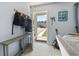 Inviting entryway with neutral tones, coat rack and guitar, offering a welcoming ambiance at 109 Winding Path Dr., Loris, SC 29569
