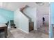 Hallway with stairway featuring grey tile flooring, neutral walls and modern trim at 109 Winding Path Dr., Loris, SC 29569