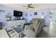 Comfortable living room with plush seating, a ceiling fan, and stylish decor, perfect for relaxation at 109 Winding Path Dr., Loris, SC 29569