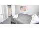 Comfortable bedroom featuring gray walls, carpet, a double bed and a closet at 1101 Peace Pipe Pl. # 201, Myrtle Beach, SC 29579
