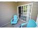 Relaxing patio with outdoor seating near sliding glass door at 1101 Peace Pipe Pl. # 201, Myrtle Beach, SC 29579