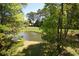 Scenic view of a tranquil pond and lush green golf course at 1101 Peace Pipe Pl. # 201, Myrtle Beach, SC 29579