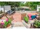 Inviting backyard featuring a patio, fire pit, swing, and tranquil water view at 12 Gloucester Pl., Pawleys Island, SC 29585
