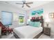 Serene bedroom with a large window, natural light, and neutral decor at 12 Gloucester Pl., Pawleys Island, SC 29585
