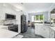 Modern kitchen featuring stainless steel appliances and white cabinets at 12 Gloucester Pl., Pawleys Island, SC 29585