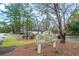 Ricefield's Swim Club sign and lush landscaping at 12 Gloucester Pl., Pawleys Island, SC 29585