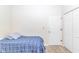 Cozy bedroom features a bed, white walls, closet, and carpeted floors at 139 Chenoa Dr. # D, Murrells Inlet, SC 29576