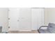 Cozy living space with two doors and futon couch at 139 Chenoa Dr. # D, Murrells Inlet, SC 29576