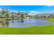 Picturesque pond with fountain and lush green surroundings in community at 139 Chenoa Dr. # D, Murrells Inlet, SC 29576