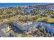 Stunning aerial view of coastal community with ocean, lake, and resort amenities at 14290 Ocean Hwy. # 210, Pawleys Island, SC 29585