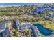 Stunning aerial view of the community showcases its proximity to the beach, a pond, and manicured landscapes at 14290 Ocean Hwy. # 210, Pawleys Island, SC 29585