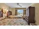 Bedroom featuring two beds, ceiling fan, nice windows and an armoire for storage at 14290 Ocean Hwy. # 210, Pawleys Island, SC 29585