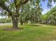 Community green space showcasing mature oak trees with Spanish moss at 14290 Ocean Hwy. # 210, Pawleys Island, SC 29585