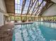 Beautiful indoor pool with vaulted ceiling and plenty of seating at 14290 Ocean Hwy. # 210, Pawleys Island, SC 29585