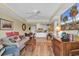 Cozy living room with a comfortable couch, adjacent to an eat-in kitchen at 14290 Ocean Hwy. # 210, Pawleys Island, SC 29585