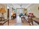 Living room and dining area with view to the outside, streaming in lots of light at 14290 Ocean Hwy. # 210, Pawleys Island, SC 29585