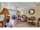Well lit living room and dining area with sliding glass door to the outside at 14290 Ocean Hwy. # 210, Pawleys Island, SC 29585