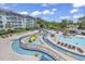 View of the pools, lazy river, area and pool-side lounging at the condo at 14290 Ocean Hwy. # 210, Pawleys Island, SC 29585