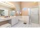Bathroom features a vanity area, tub and glass enclosed shower at 1486 Medinah Ln., Murrells Inlet, SC 29576