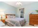Bedroom features a window for natural light and a dresser at 1486 Medinah Ln., Murrells Inlet, SC 29576