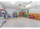 Spacious garage with ample storage and organization solutions, and an automatic door opener at 1486 Medinah Ln., Murrells Inlet, SC 29576