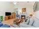 Comfortable living room featuring a fireplace, TV, and a relaxing seating arrangement at 1486 Medinah Ln., Murrells Inlet, SC 29576