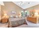 Spacious bedroom featuring vaulted ceilings, neutral walls, and natural light at 1486 Medinah Ln., Murrells Inlet, SC 29576