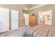 Spacious bedroom with ensuite bath, walk in closet and neutral walls at 1486 Medinah Ln., Murrells Inlet, SC 29576