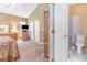 Spacious bedroom with ensuite bath, walk in closet and neutral walls at 1486 Medinah Ln., Murrells Inlet, SC 29576