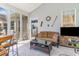 Inviting sunroom with plenty of natural light, comfortable seating, and outdoor view at 1486 Medinah Ln., Murrells Inlet, SC 29576