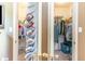 Walk-in closet features shelving and rods for optimal storage at 1486 Medinah Ln., Murrells Inlet, SC 29576