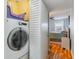 Close-up of a dryer located next to a doorway to a bedroom at 1500 Cenith Dr. # F103, North Myrtle Beach, SC 29582