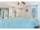 Inviting main bedroom featuring hardwood floors, a ceiling fan, and a white dresser at 1500 Cenith Dr. # F103, North Myrtle Beach, SC 29582