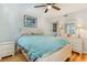 Inviting main bedroom with hardwood floors, a ceiling fan, and ample natural light at 1500 Cenith Dr. # F103, North Myrtle Beach, SC 29582