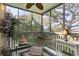 Screened patio with seating and scenic outdoor views provides a serene relaxation space at 1500 Cenith Dr. # F103, North Myrtle Beach, SC 29582