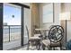 Balcony with view of beach and dining seating at 1501 South Ocean Blvd. # 643, Myrtle Beach, SC 29577